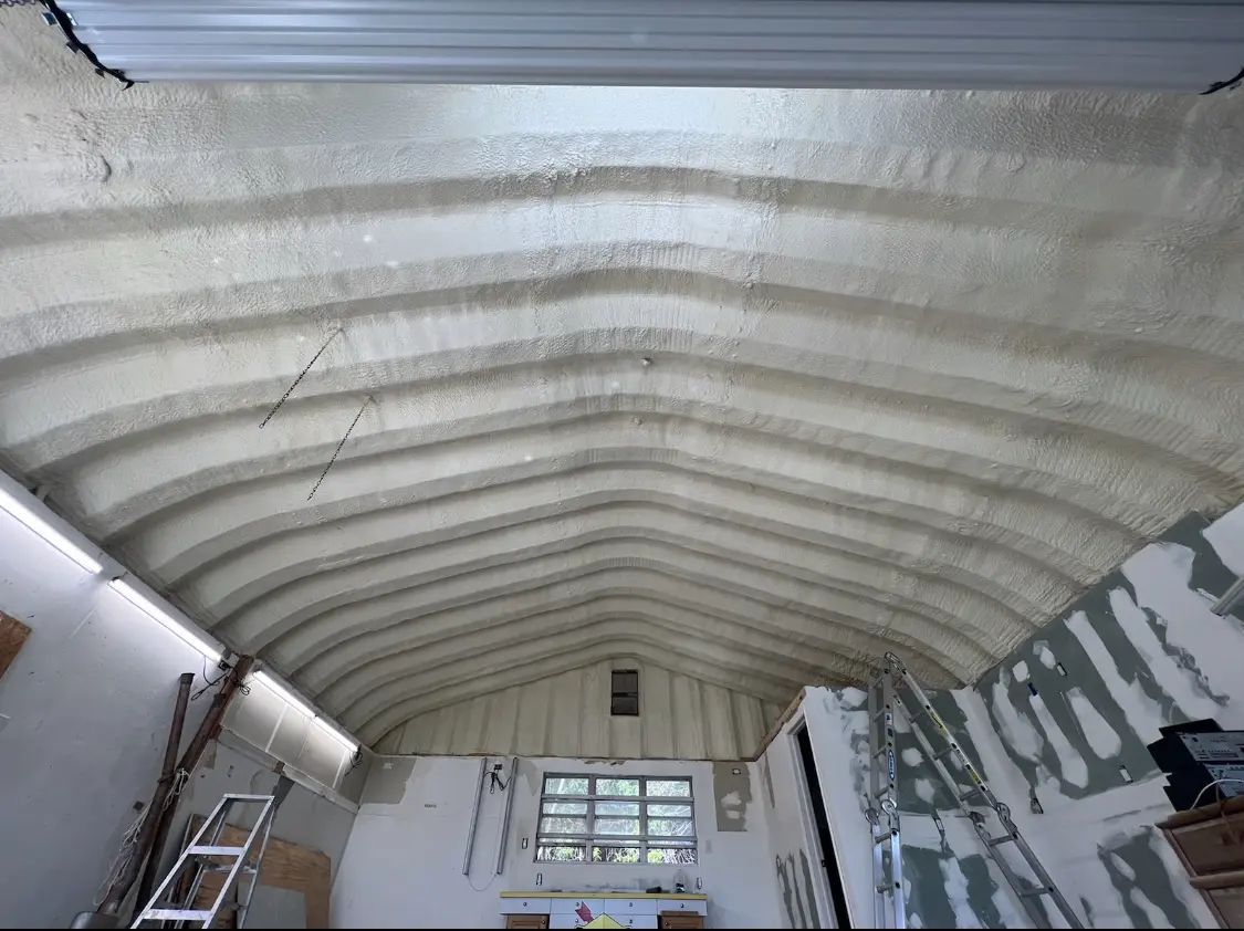 Spray polyurethane foam applied to the underside of a metal roof deck in Orangevale